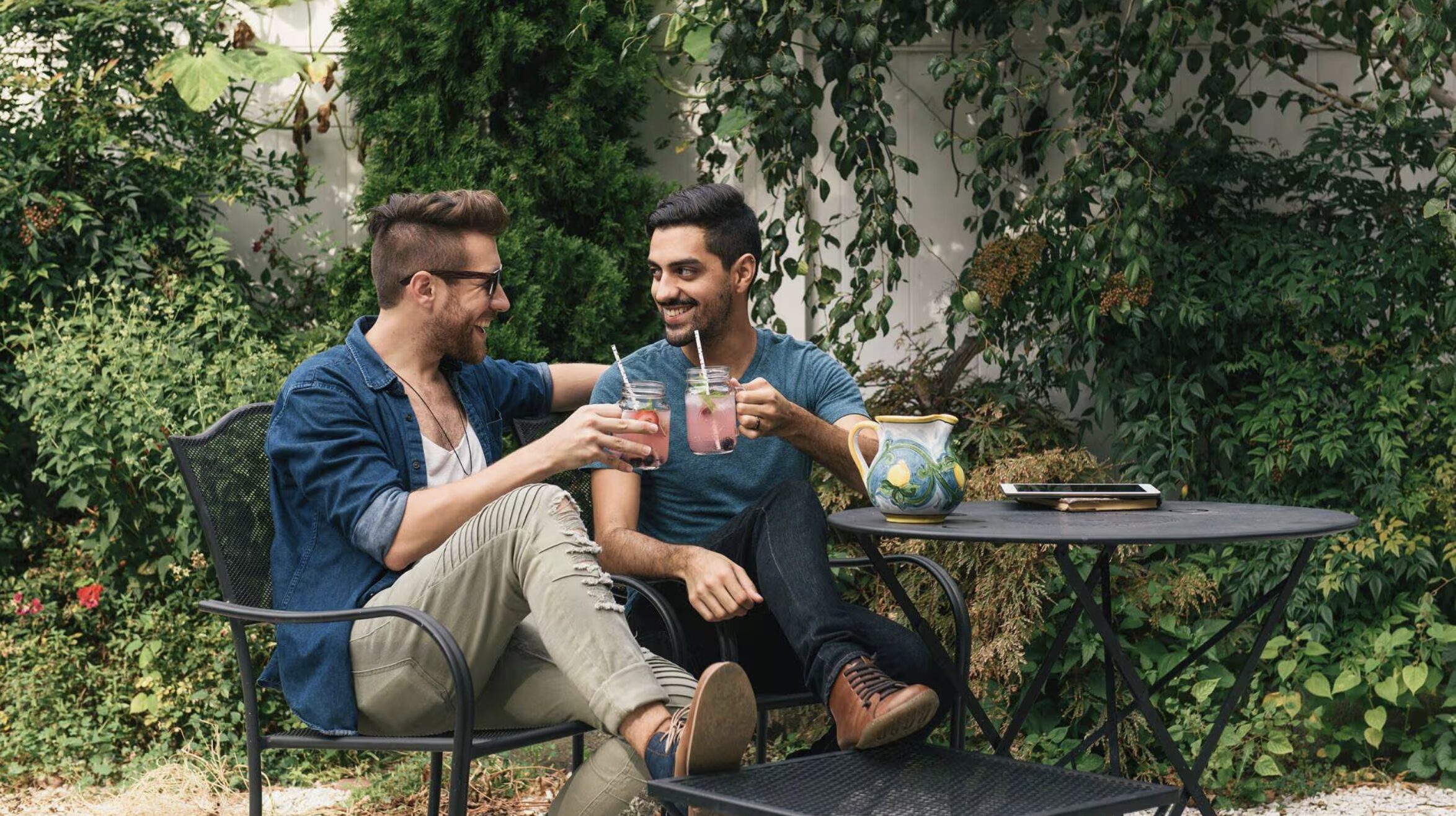 two guys having backyard drinks