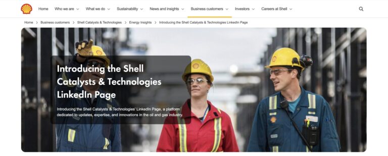 Energy professionals in hard hats at refinery