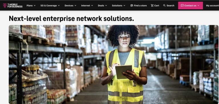 Woman looking at digital device in warehouse