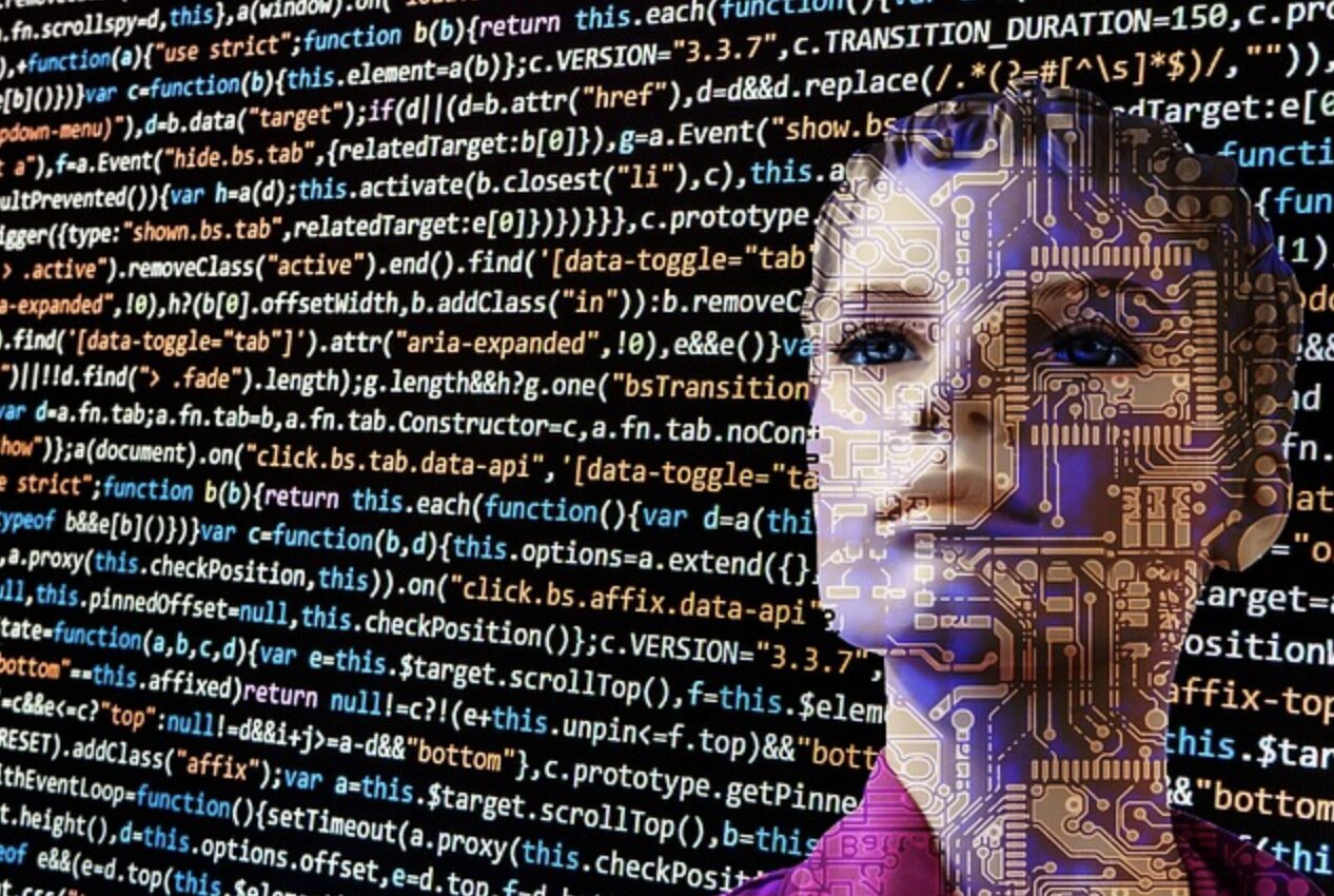 glowing computer code over womans face