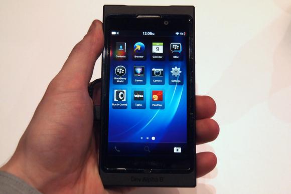 hand holding blackberry device